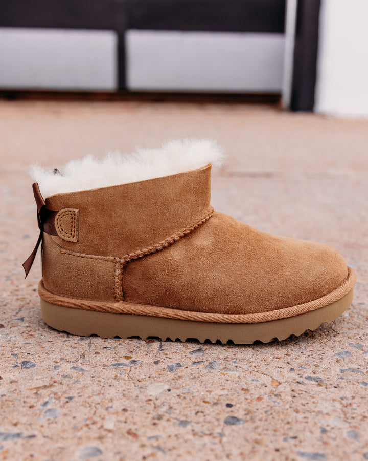 UGG: Children's Ultra Mini Bailey Bow Boot in Chestnut