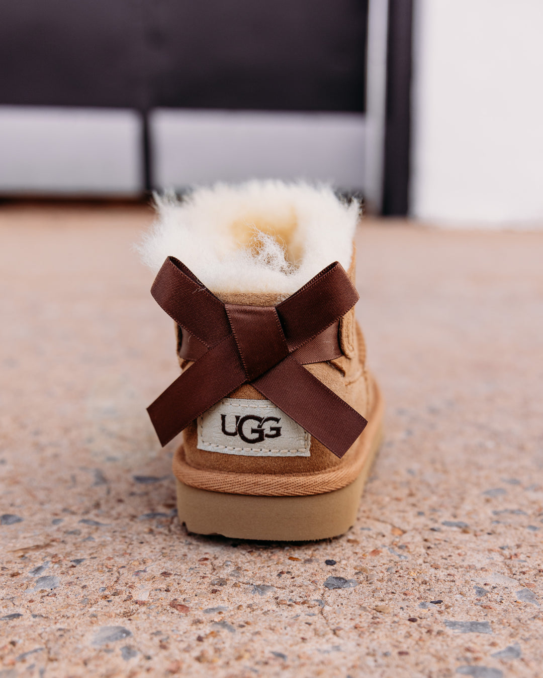 UGG: Children's Ultra Mini Bailey Bow Boot in Chestnut