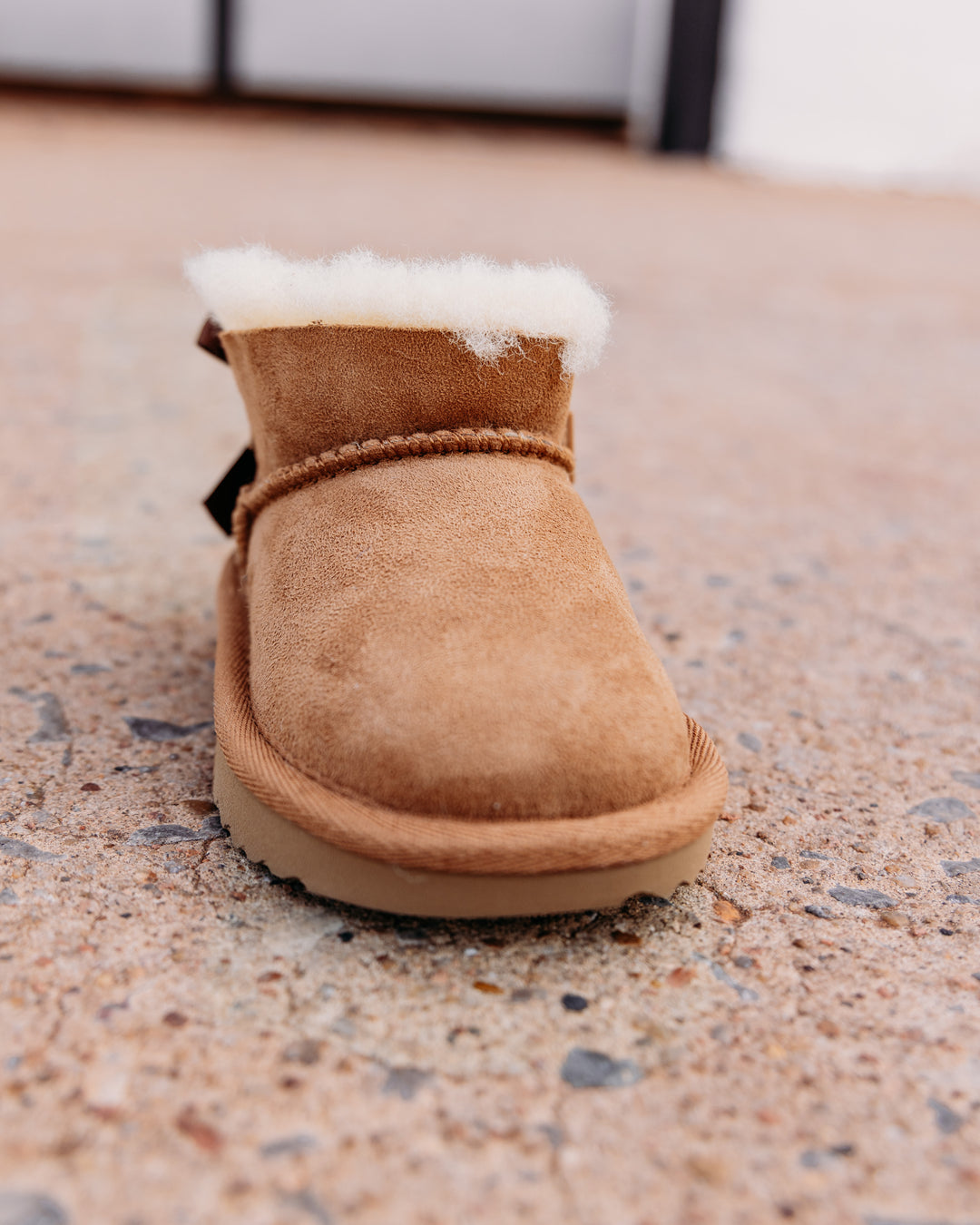 UGG: Children's Ultra Mini Bailey Bow Boot in Chestnut
