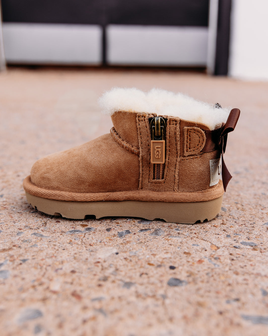 UGG: Children's Ultra Mini Bailey Bow Boot in Chestnut