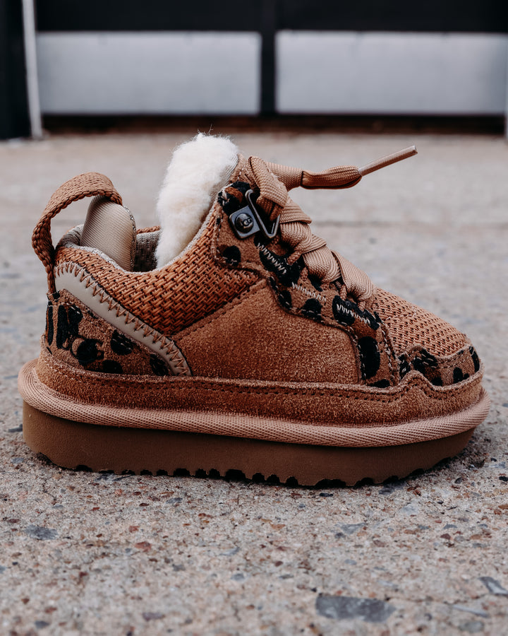 fur lined chestnut colored tennis shoe with leopard sheepskin details