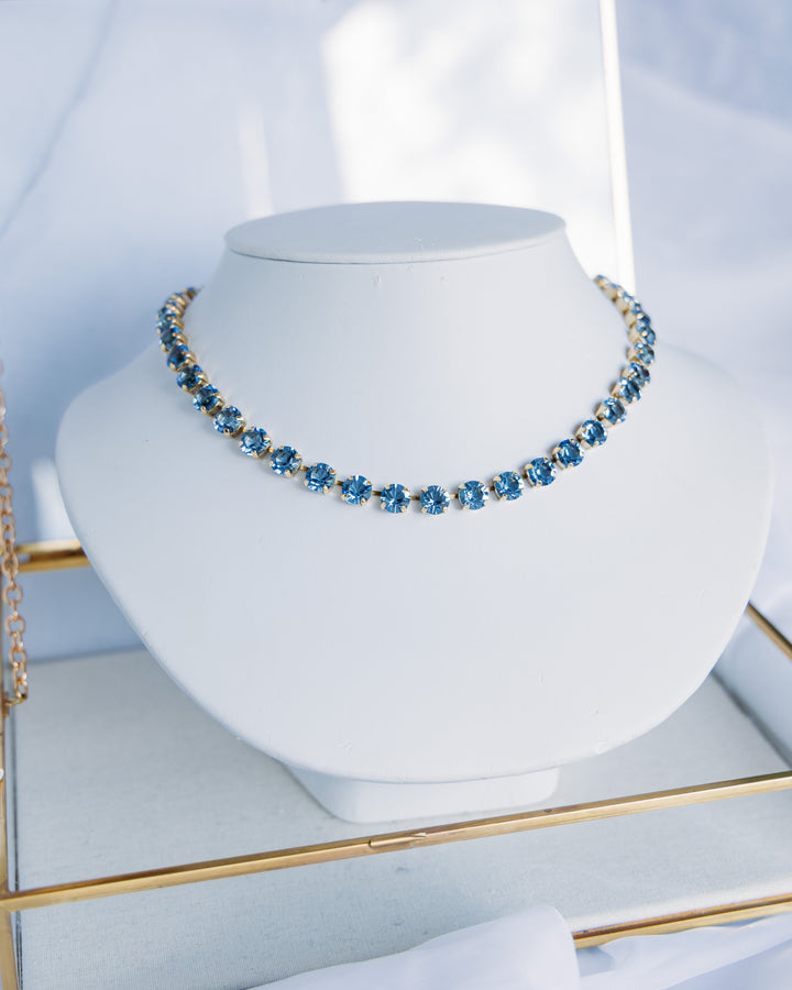 TOVA: ( N5715LSUN) Oakland Necklace Fairy Dust / Light Sapphire Unfoiled