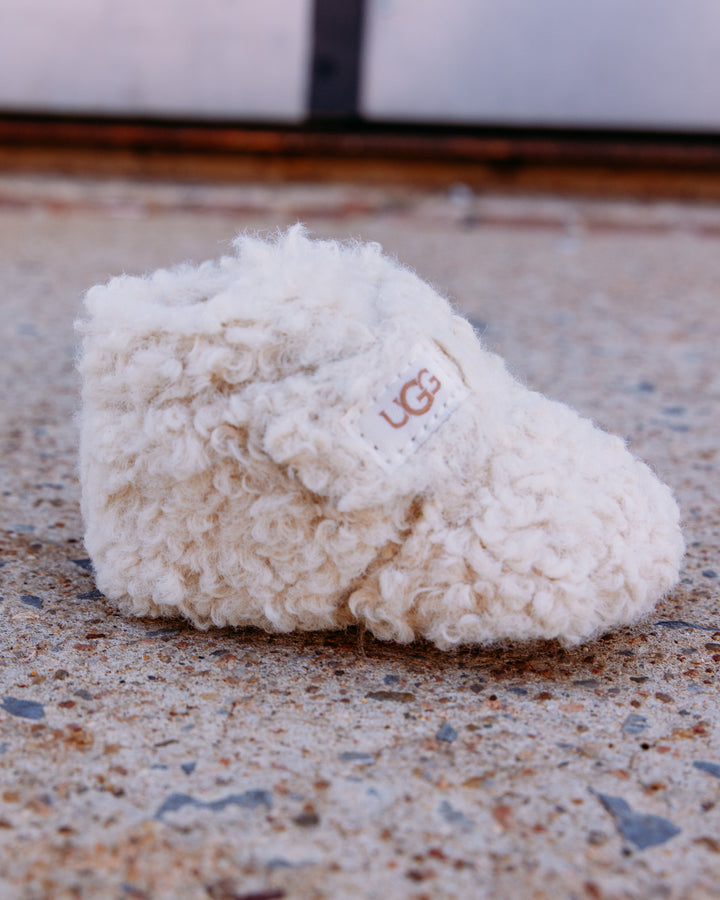 UGG: Kids Bixbee in Natural Curly Faux Fur