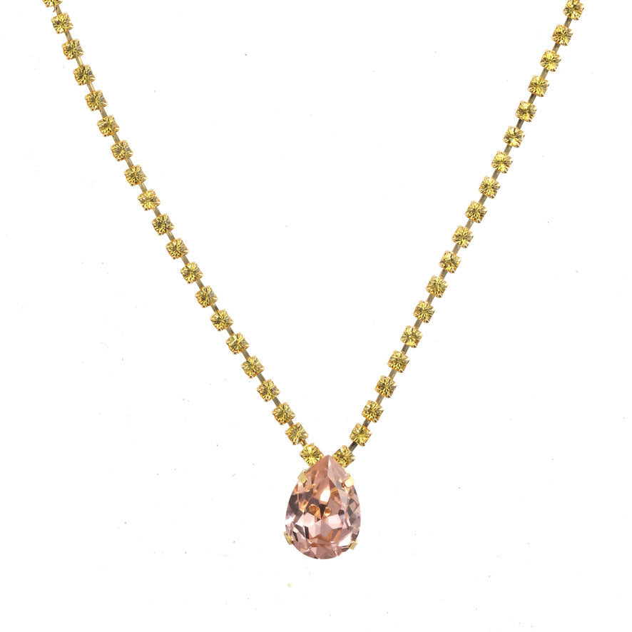 Tova Milli necklace with gold chain and teardrop pink crystal pendant