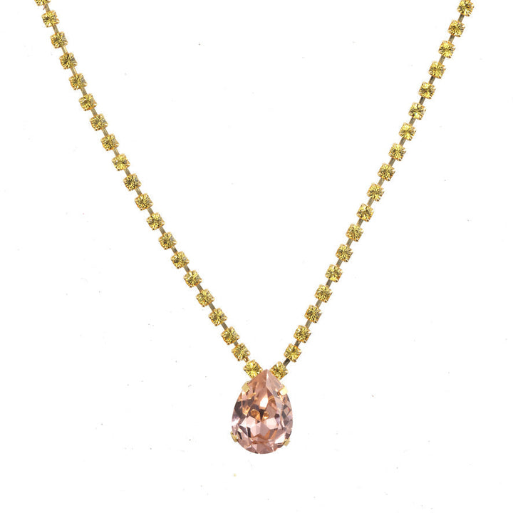 Tova Milli necklace with gold chain and teardrop pink crystal pendant
