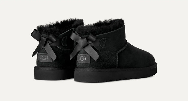 UGG: Ultra Mini Bailey Bow Boot in Black (1185491)