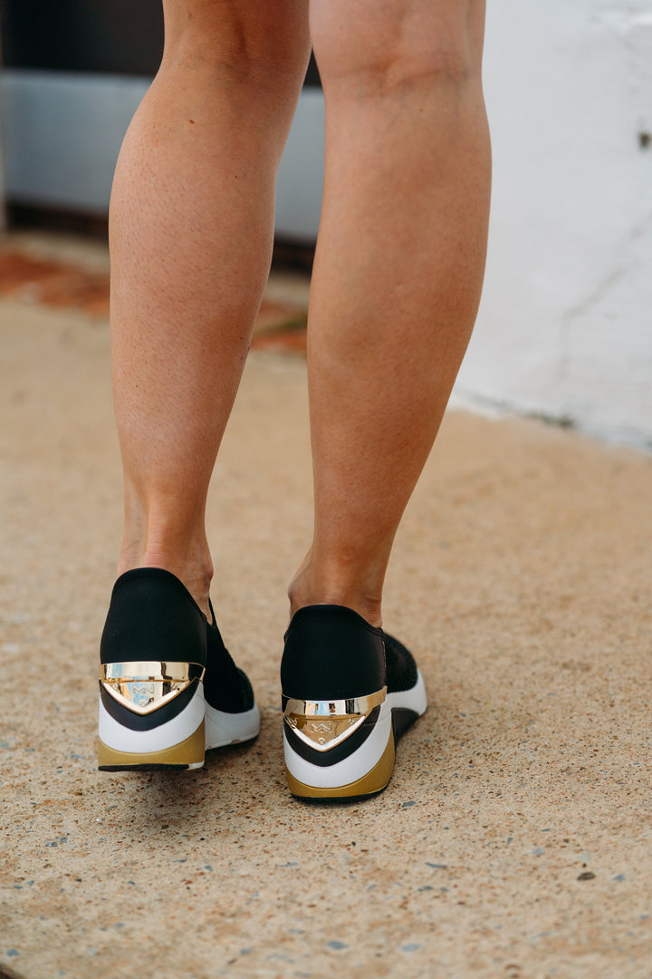 Skechers: A Wedge Crecent Sneaker in Black - The Vogue Boutique