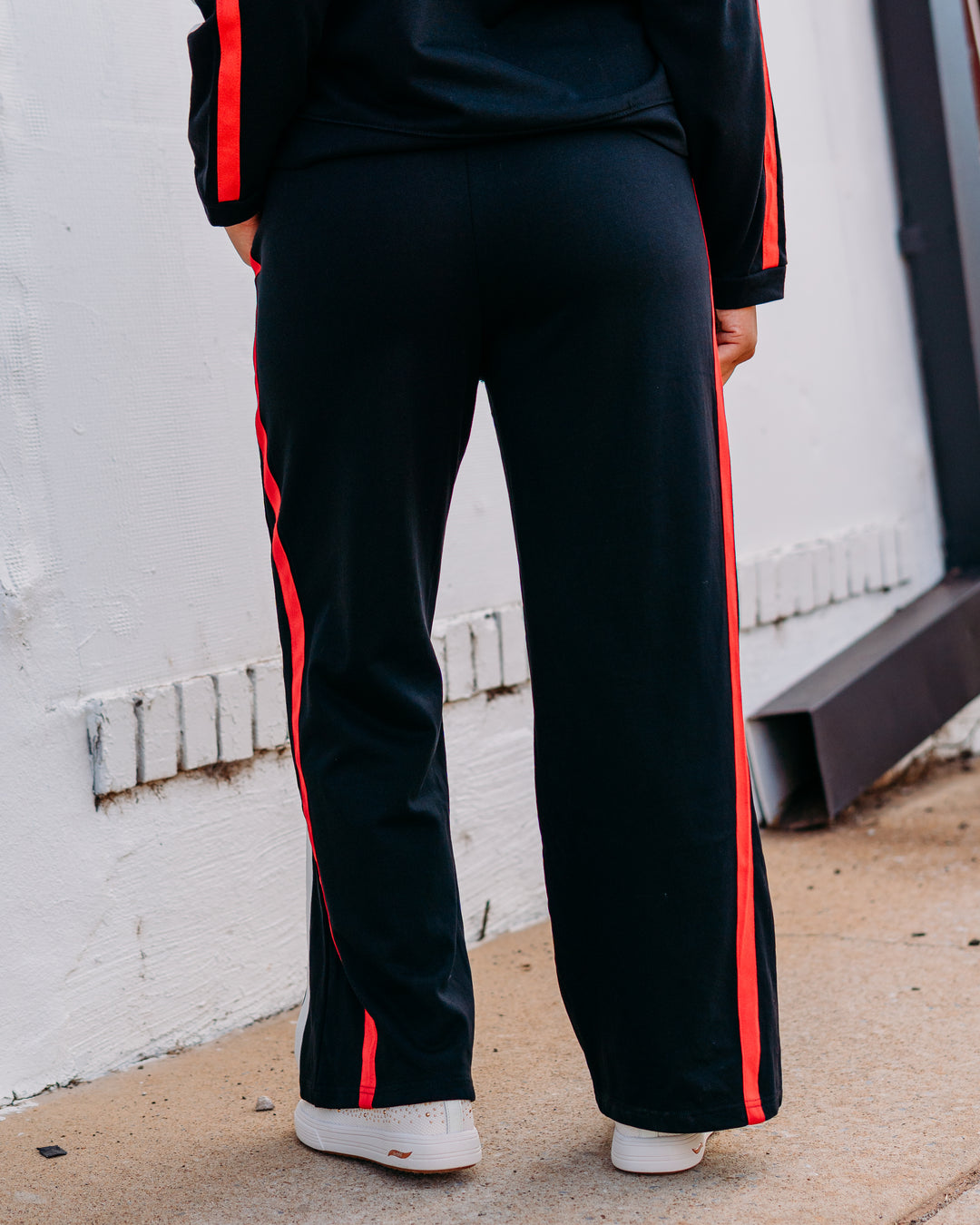 Jodifl: Track Pant in Black, Red, and Black