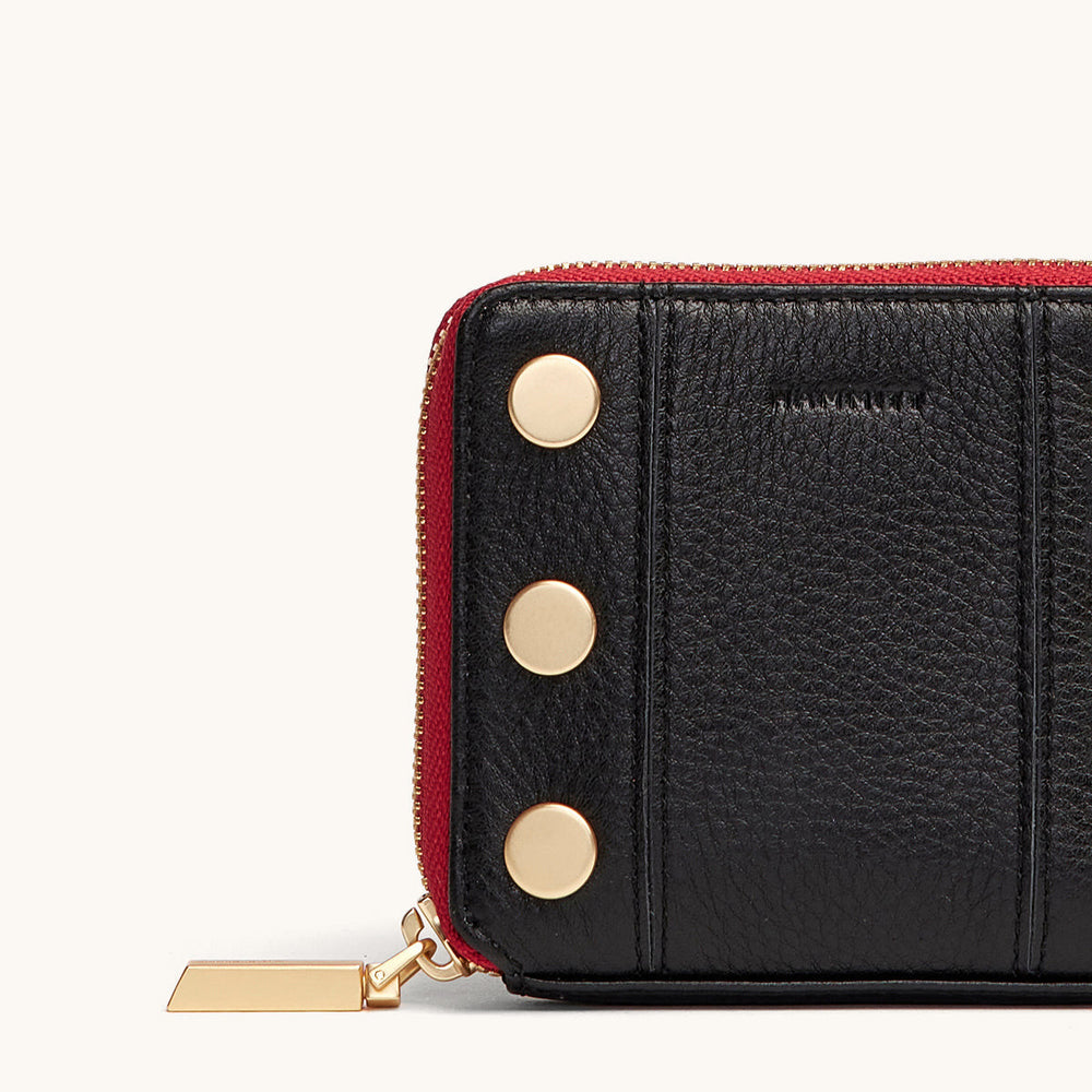 Hammitt 5 North wallet in black leather with red zip and gold stud details