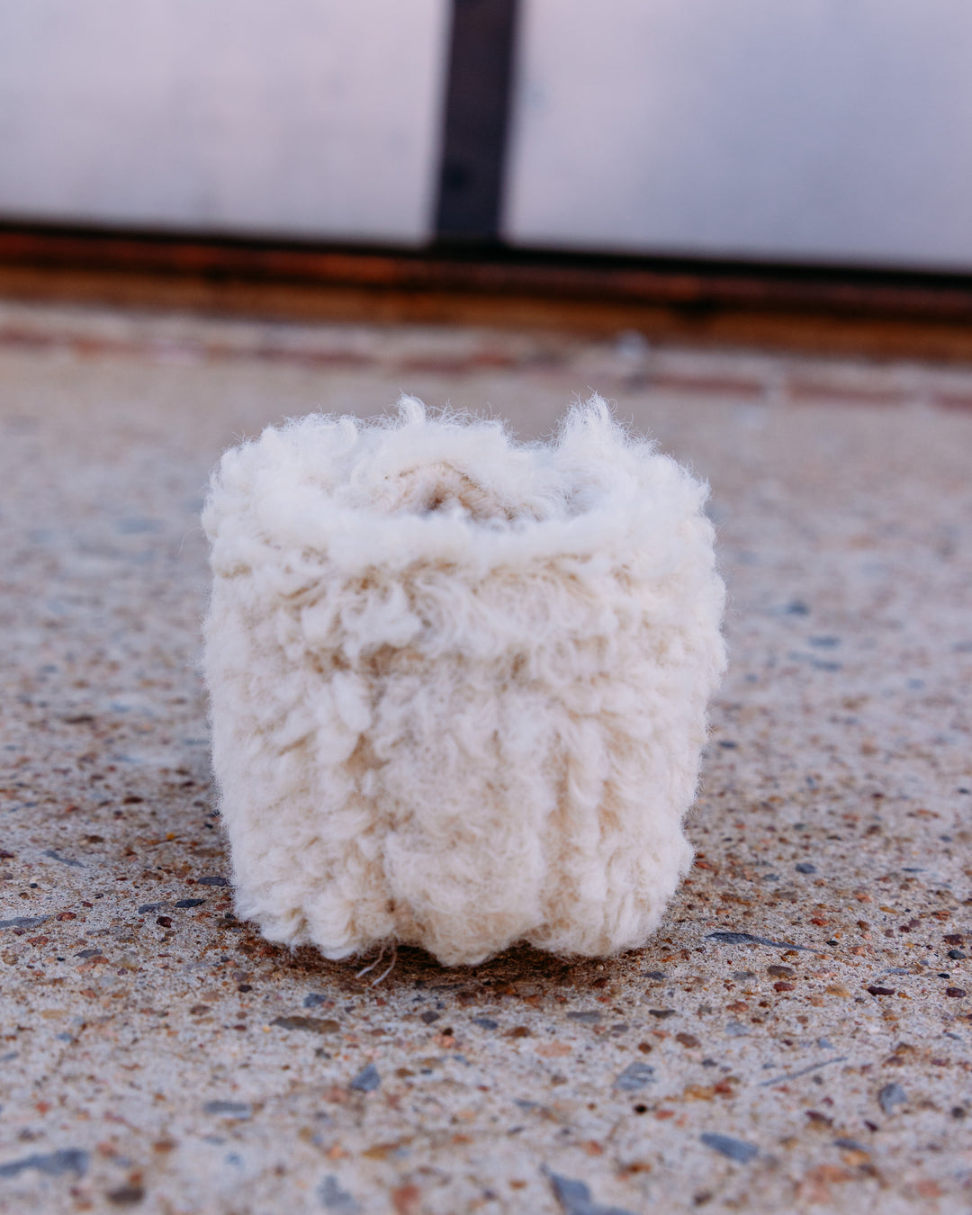 UGG: Kids Bixbee in Natural Curly Faux Fur