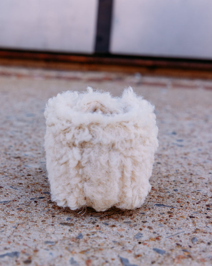 UGG: Kids Bixbee in Natural Curly Faux Fur