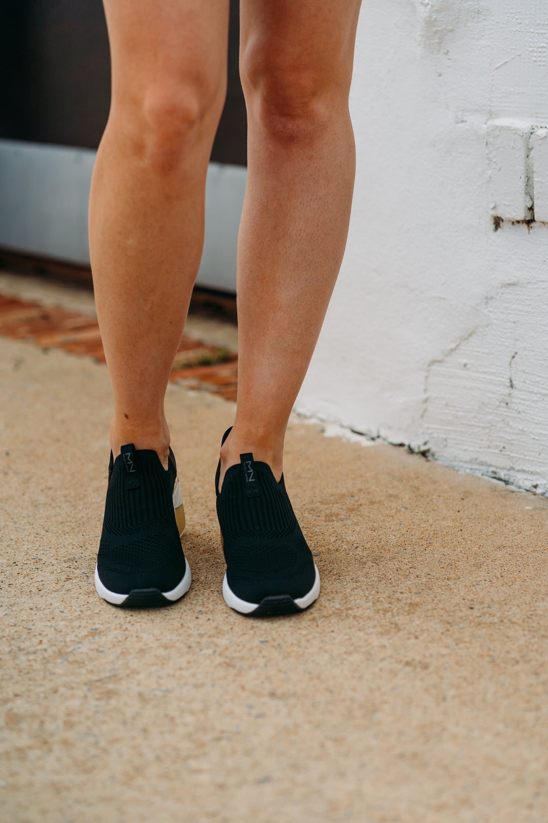 Skechers: A Wedge Crecent Sneaker in Black - The Vogue Boutique