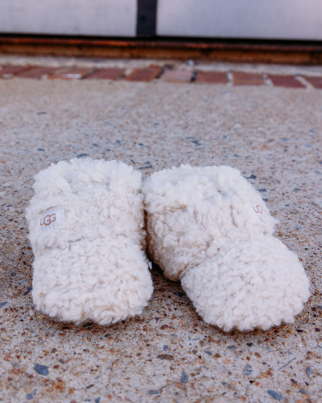 UGG: Kids Bixbee in Natural Curly Faux Fur