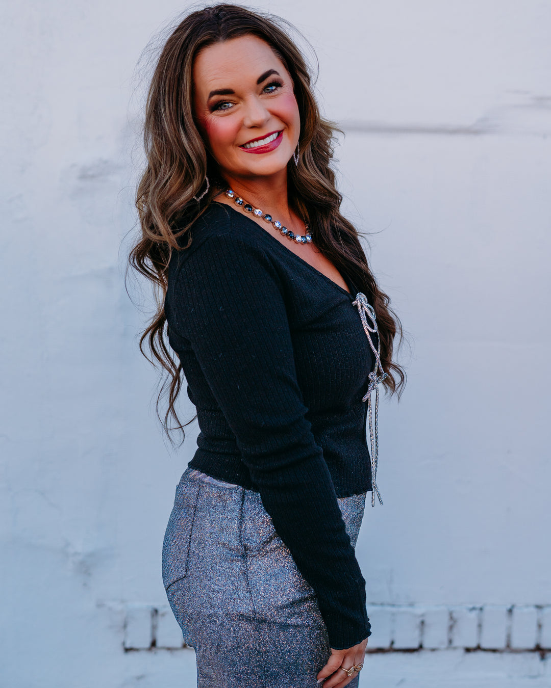 Design History: Crystal Bow Cardigan in Black - The Vogue Boutique