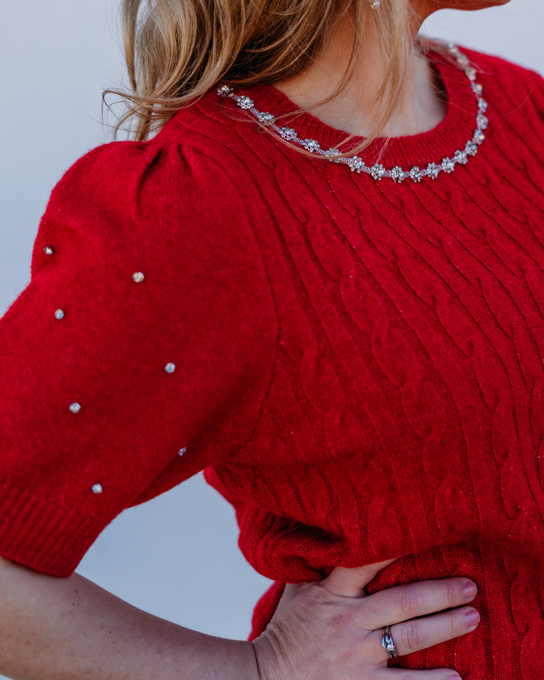 Design History: Rhinestone Sleeve Sweater in Cherry - The Vogue Boutique