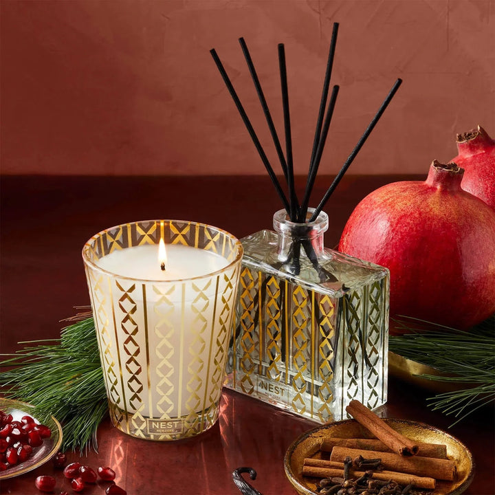 NEST New York Holiday Classic Candle and Reed Diffuser Set with gold geometric pattern