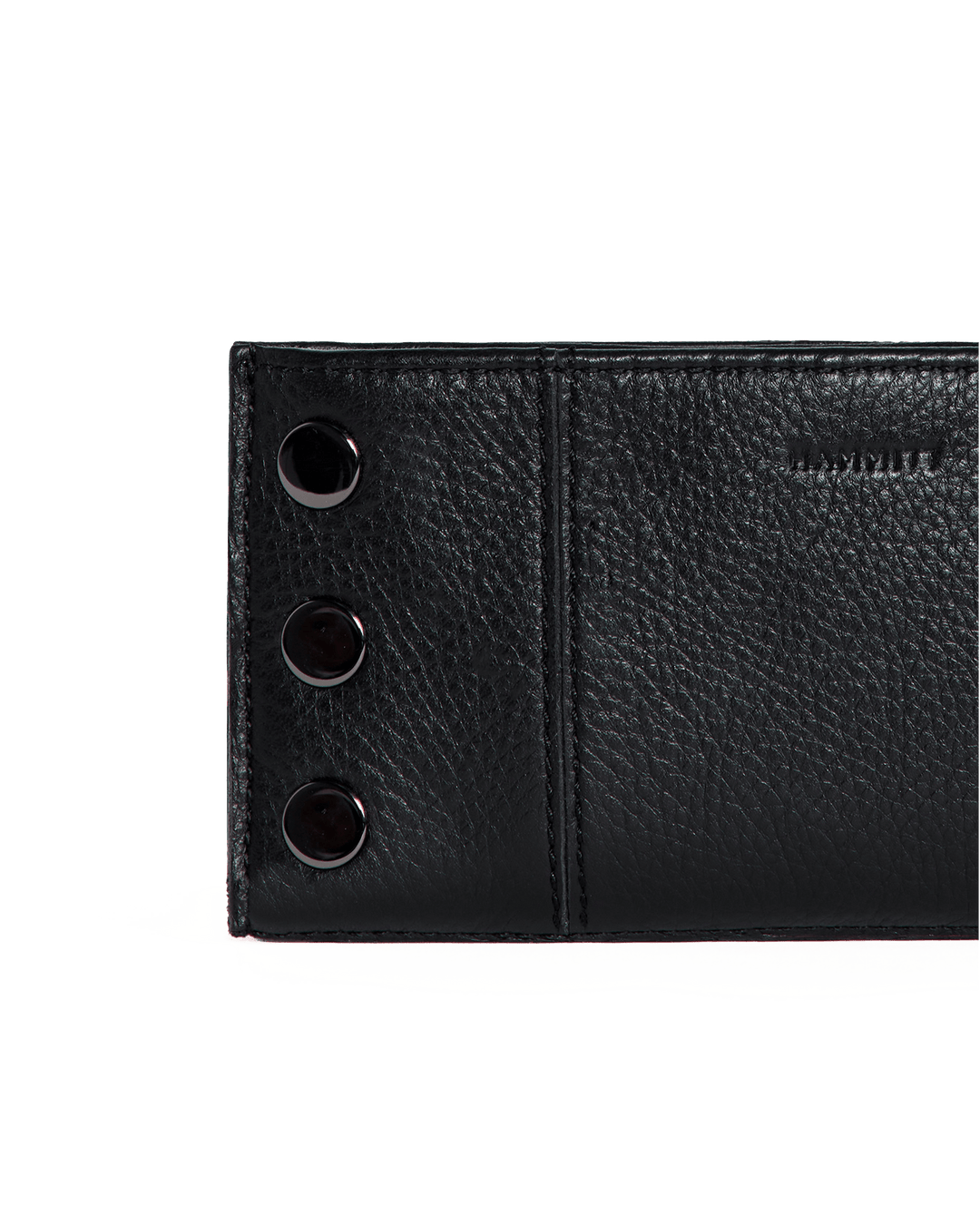 Close-up detail of Hammitt 110 North wallet in black leather with gunmetal studs