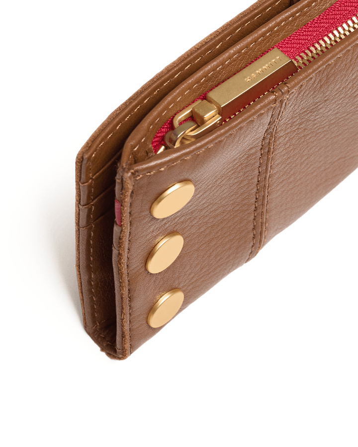 Hammitt 110 North wallet in mahogany pebble leather with gold studs and red zipper detail