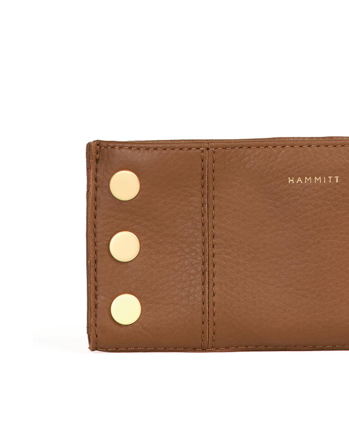 Hammitt 110 North wallet in mahogany pebble leather with gold studs detail close-up
