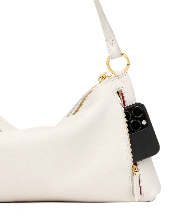 Hammitt Kyle Med bag in calla lily white leather with gold zippers and side phone pocket