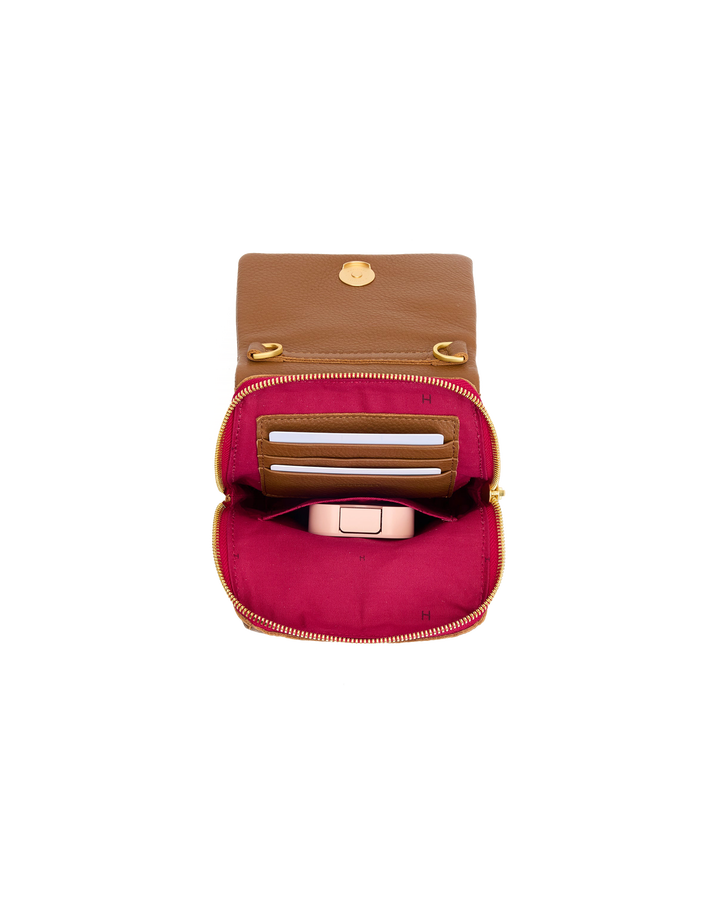 Hammitt VIP Mobile bag open showing red interior, card slots, and gold zipper