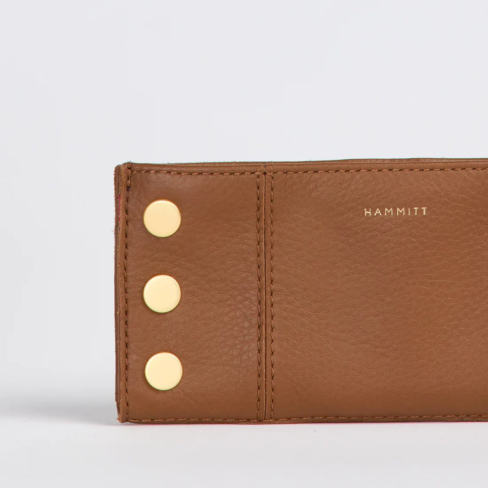 Hammitt 110 North wallet in mahogany pebble leather with gold studs and red zip detail