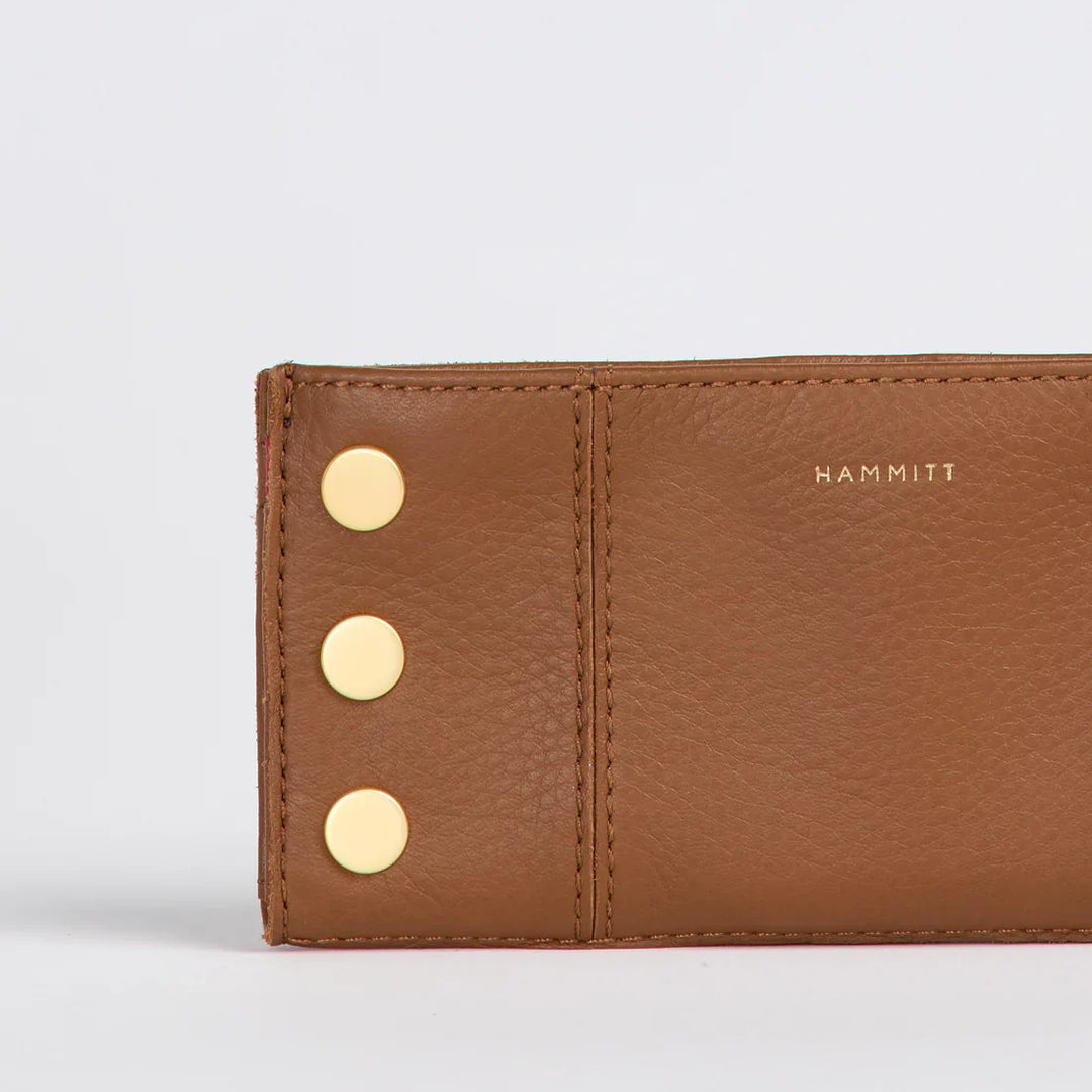 Hammitt 110 North wallet in mahogany pebble leather with gold studs and red zip detail