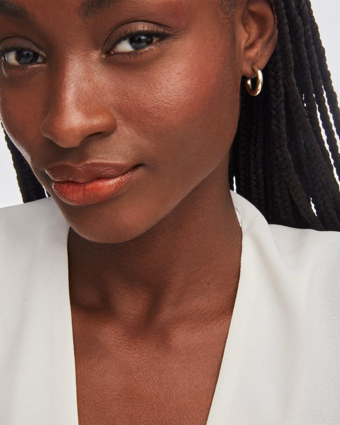 Kendra Scott: Colette Huggie Earrings in Gold - The Vogue Boutique