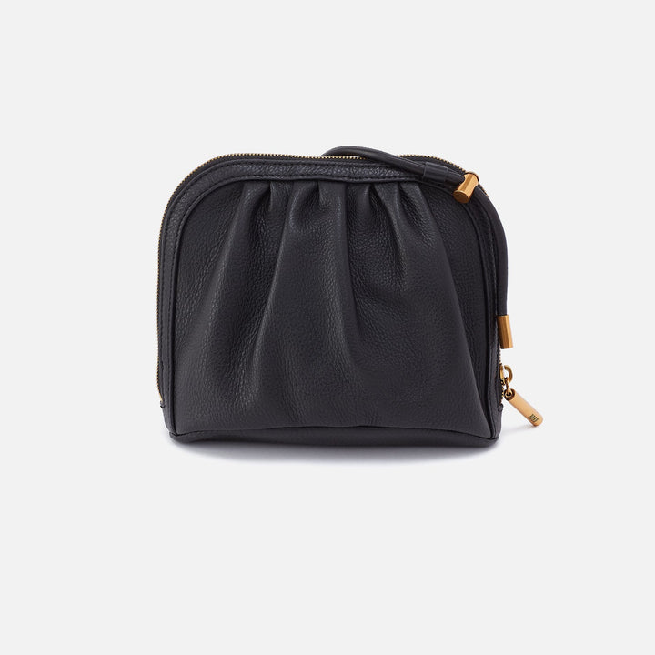 Black leather crossbody bag with gathered design and gold hardware details