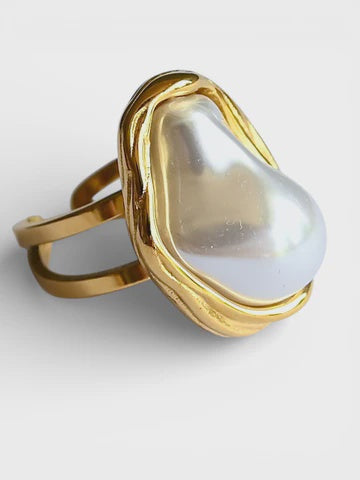 Farrah B Oceans Apart ring featuring large baroque pearl in gold bezel setting