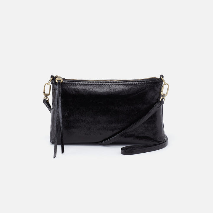 Hobo Darcy black leather crossbody bag with shoulder strap on white background