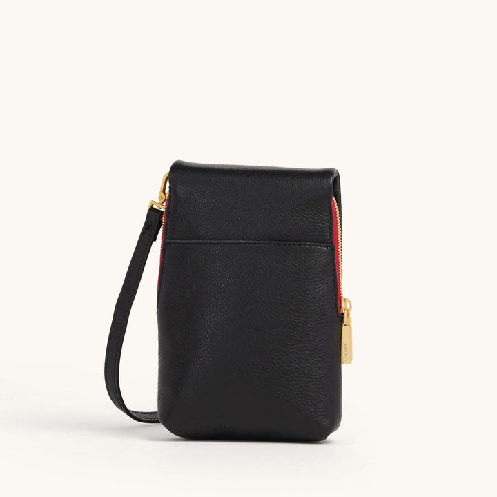 Hammitt VIP Mobile crossbody bag in black leather with red zipper and gold hardware