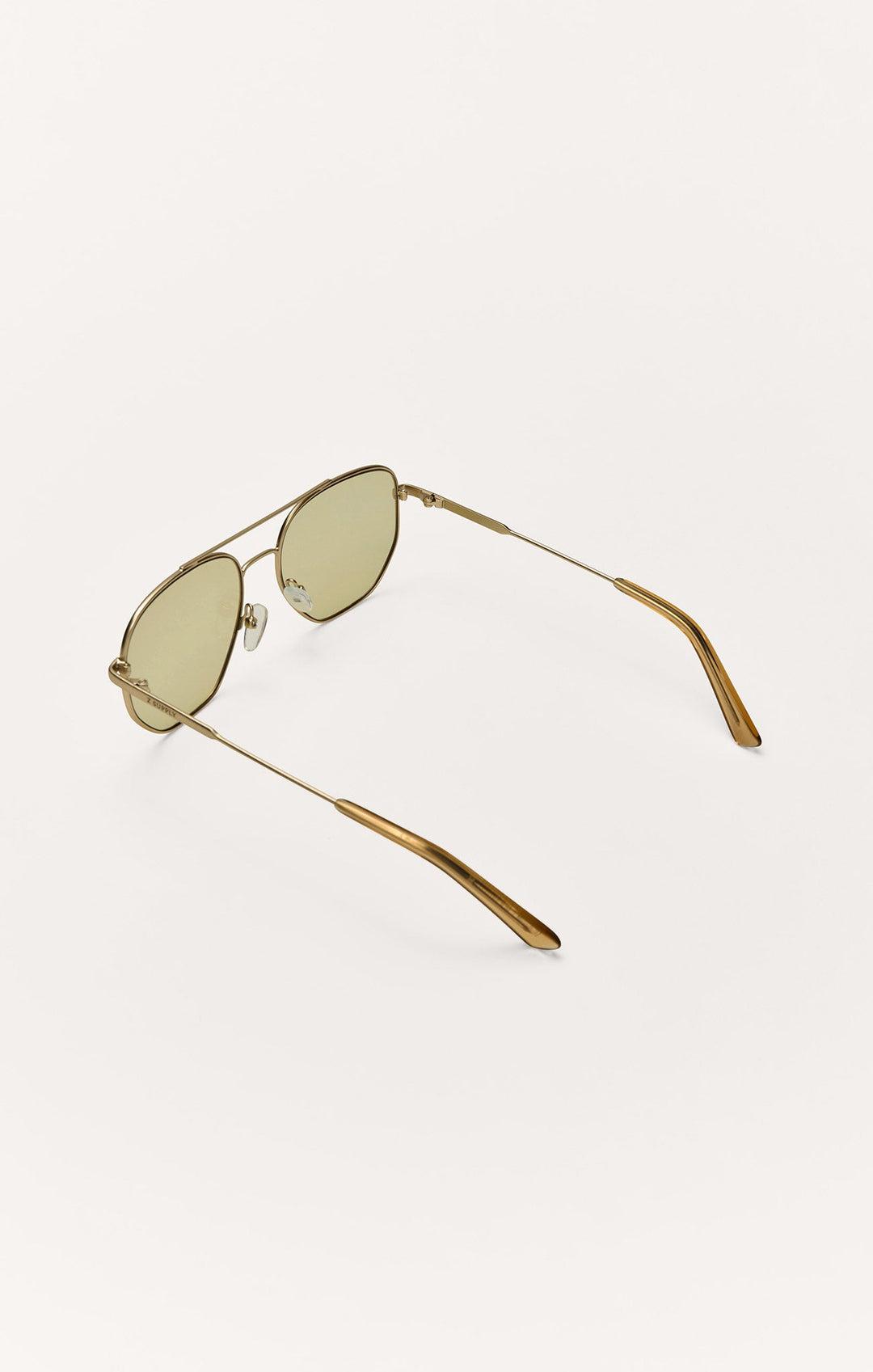 Z Supply Highway sunglasses in gold metal frame with gradient polarized lenses, angled back view