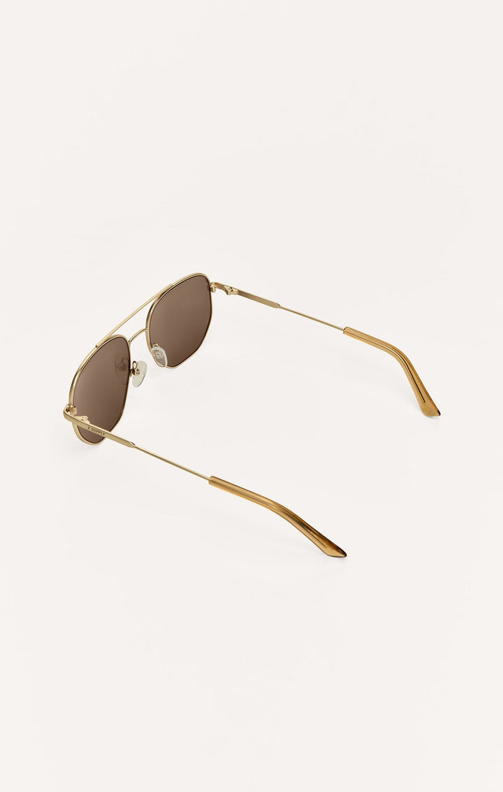 Z Supply Highway sunglasses in satin gold with brown polarized lenses, angled back view