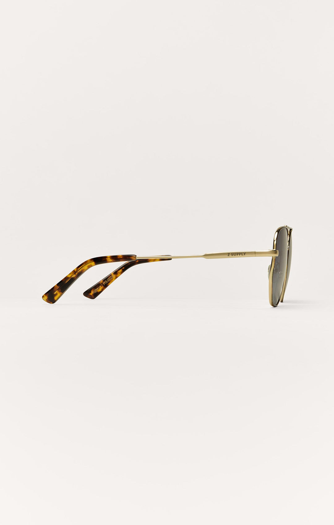 Z Supply Highway sunglasses side view showing gold frame and tortoise temple tips