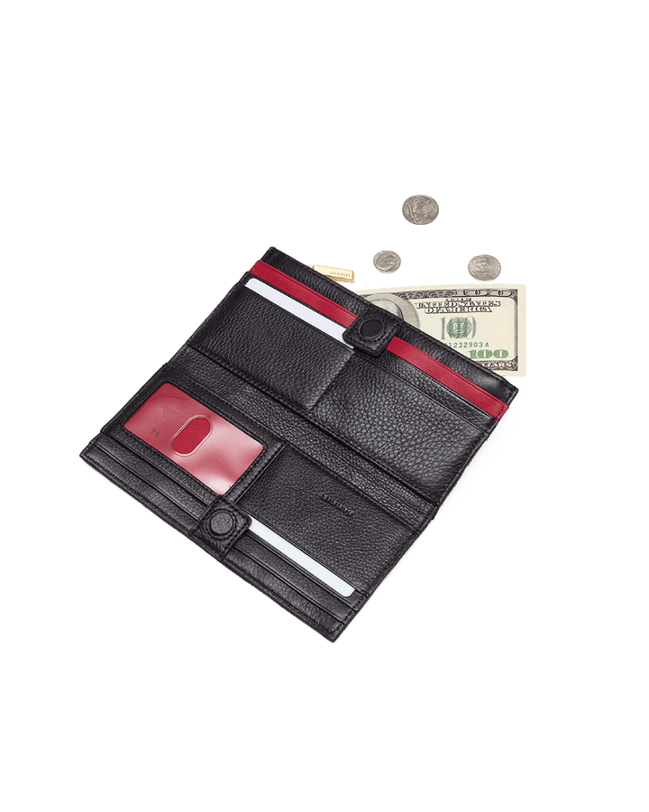 Hammitt 110 North wallet open showing black leather red lining with cash cards and coins