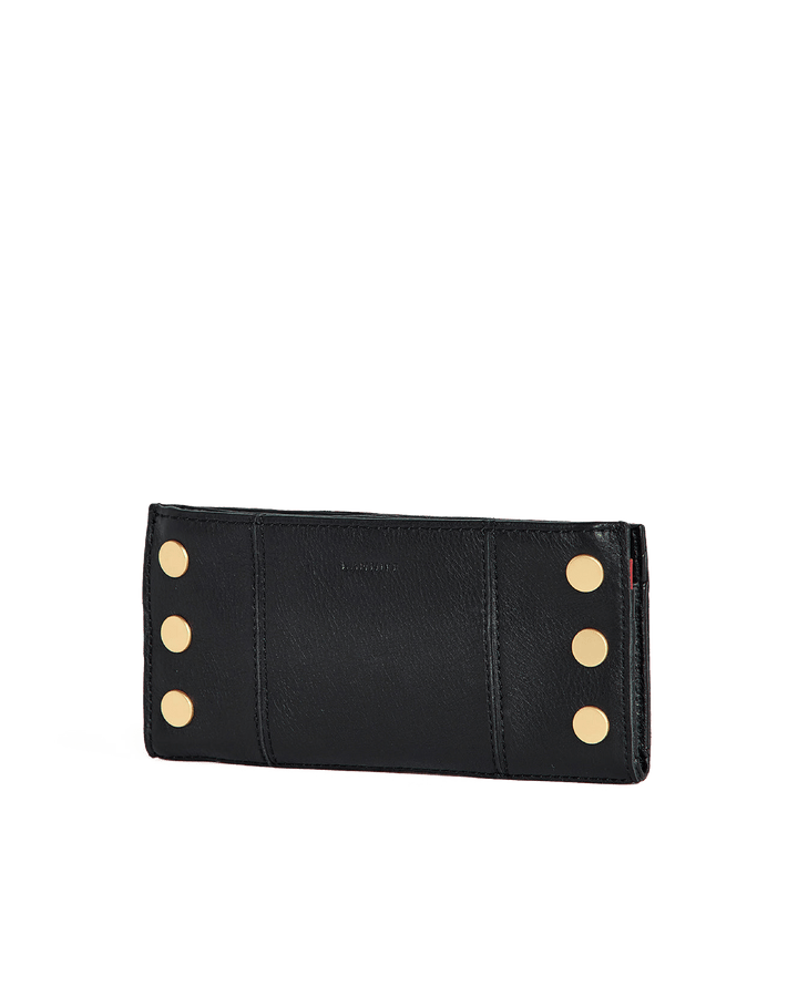 Hammitt 110 North wallet in black leather with gold studs and red zip detail, back view