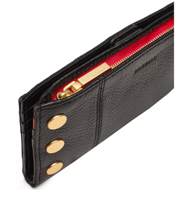 Hammitt 110 North wallet in black leather with gold studs and red zipper detail